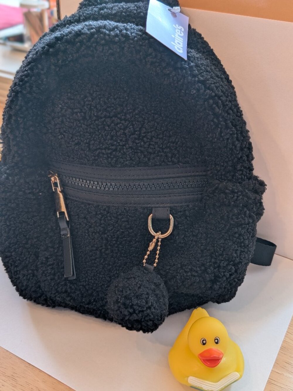 Claire’s Fuzzy Black Mini Backpack w/ Pom‑Pom – NWT